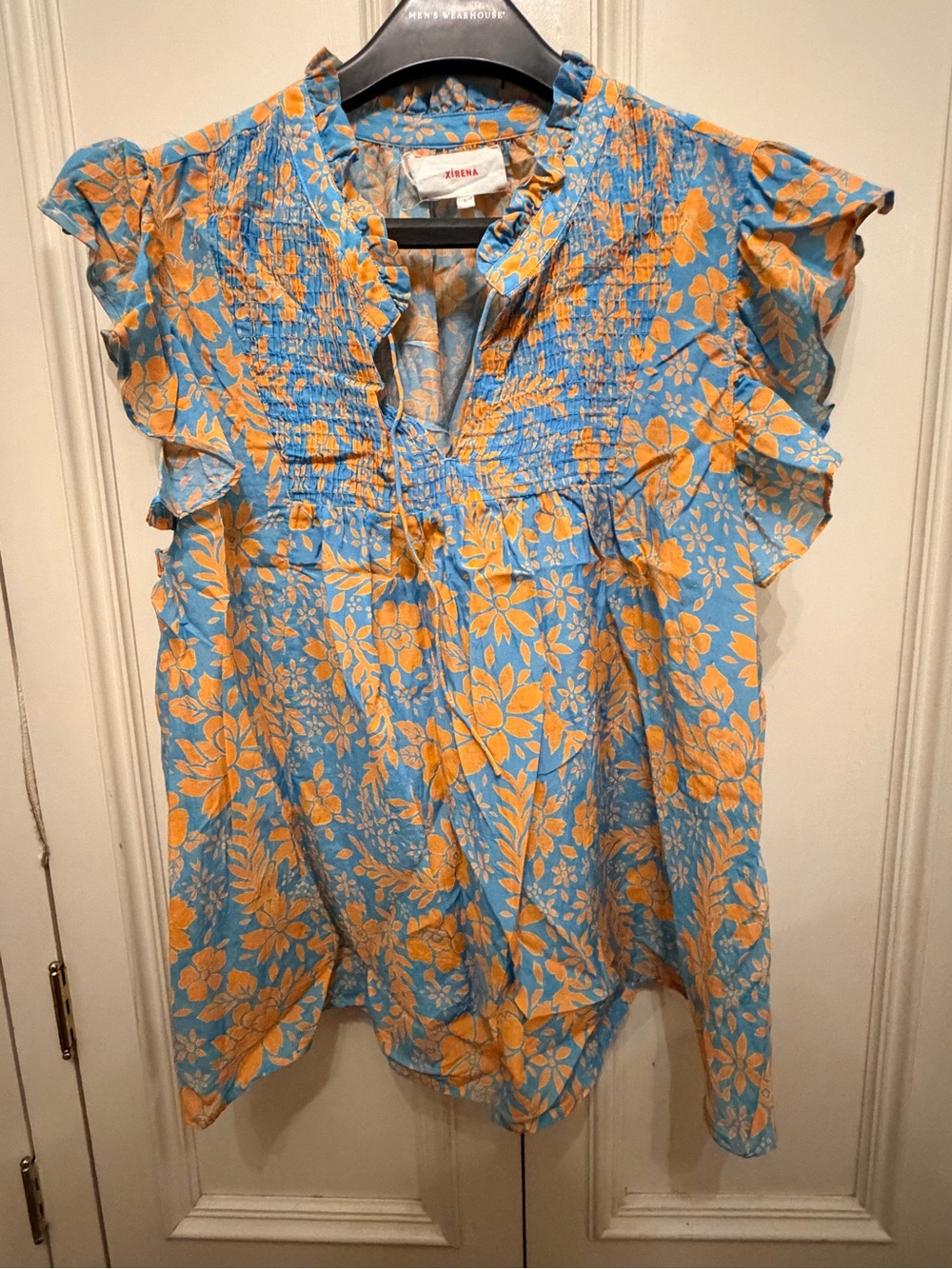 XiRENA Blue Floral Top with Orange Print and Ruffle Sleeves